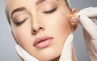 Close-up of a woman receiving a Botox injection near her eye.