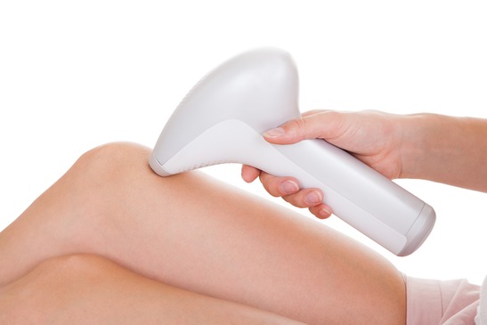 model using a hair removal machine