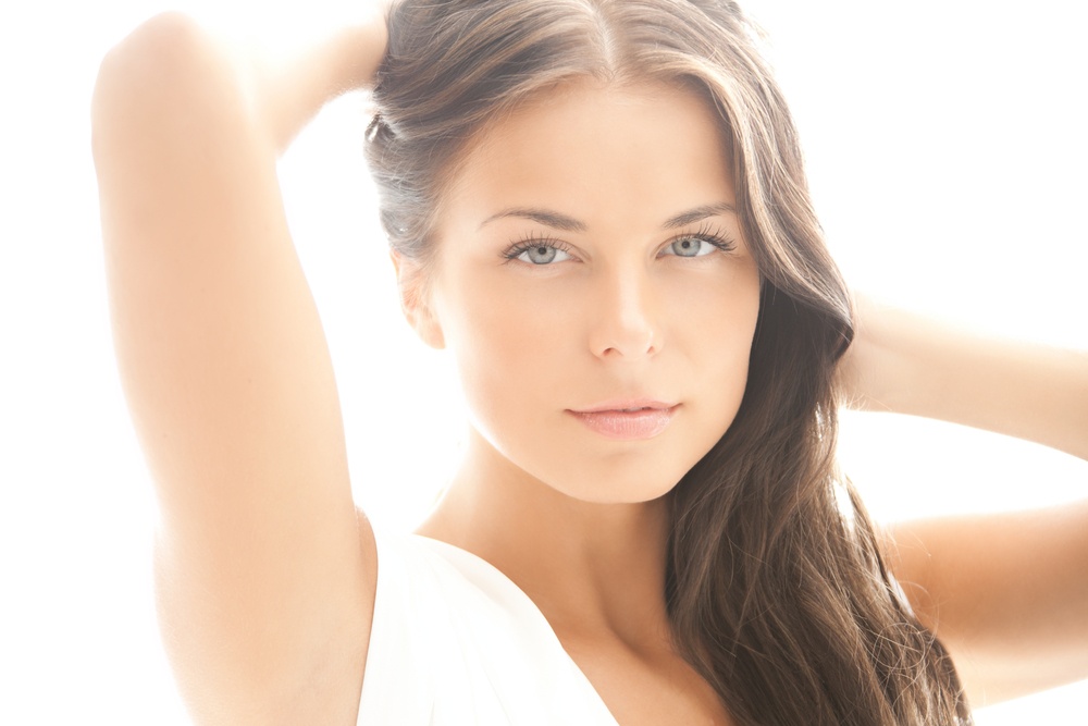 model posing after a skin brightening treatment