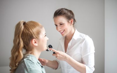 Dermatologist Inspecting Patient Face Skin with Dermatoscope