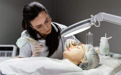 Cosmetic dermatologist performing a precise treatment on a patient's lips.