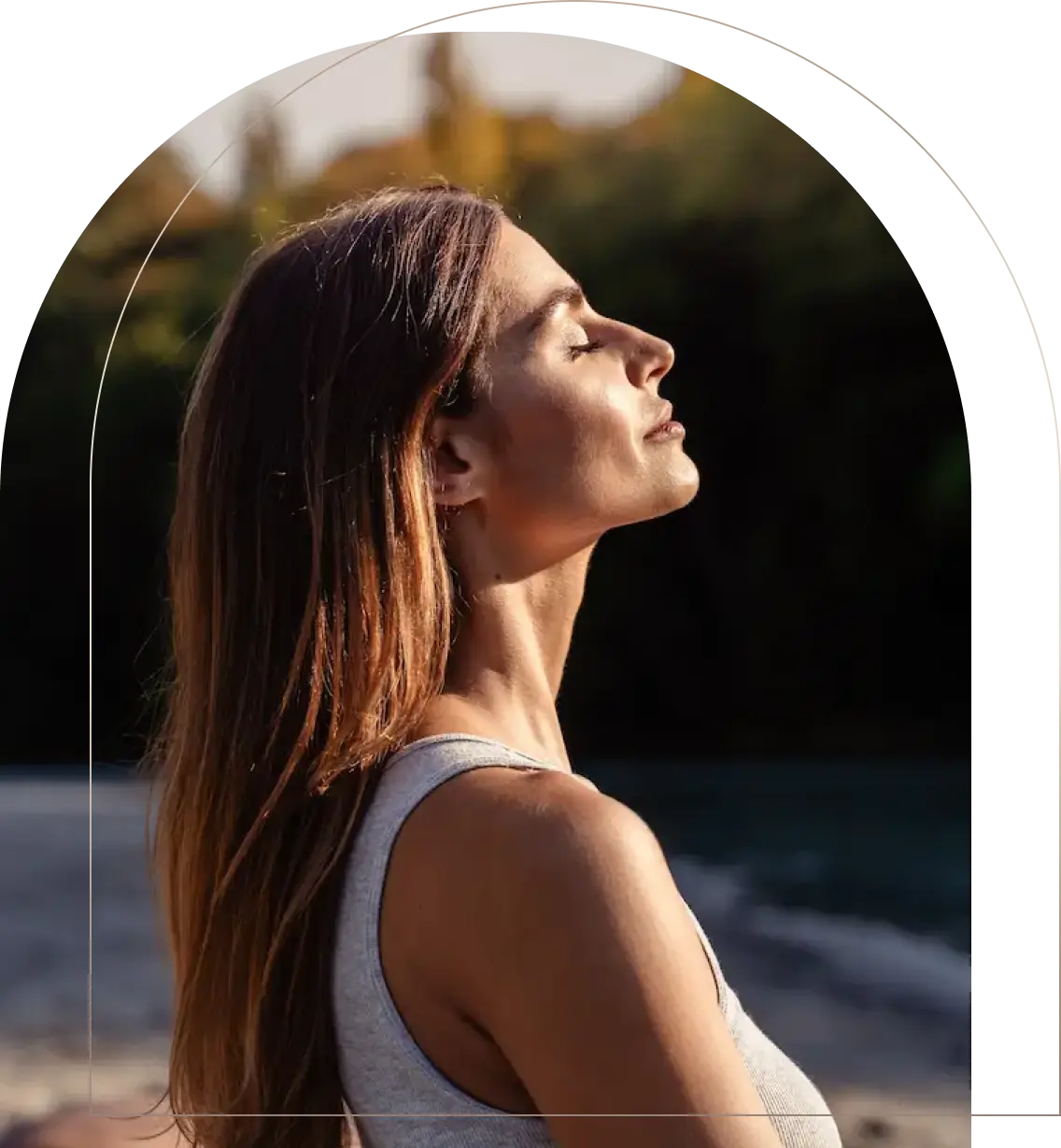 Woman practicing mindfulness meditation outdoors with eyes closed Woman meditating peacefully near water outdoors
